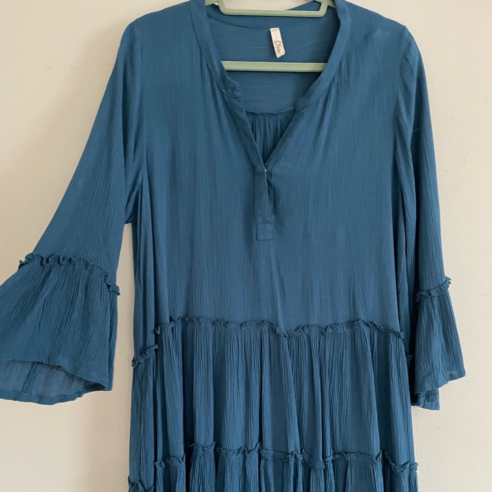 Blue dress with tiers and bell sleeves